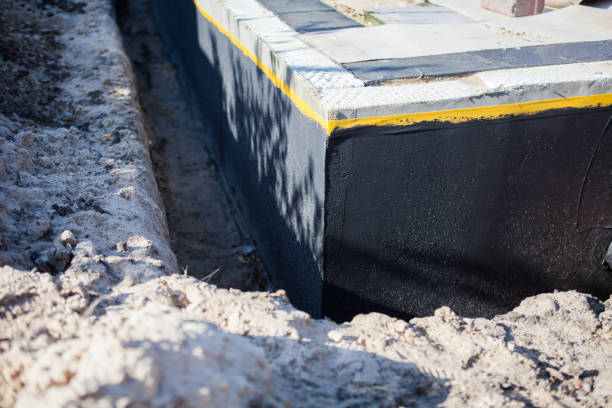 Professional Waterproofing technician working in Monroe, WA